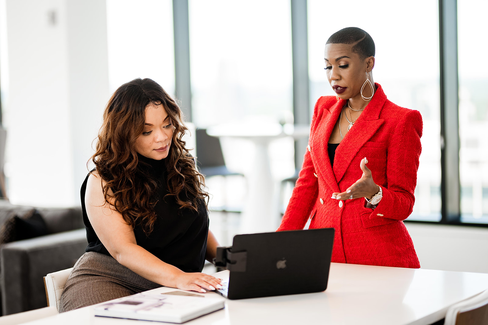Liz J. Simpson working with a client